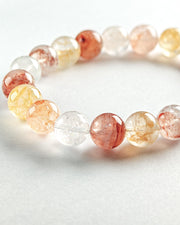 Beaded bracelet with multicolored beads on a white background